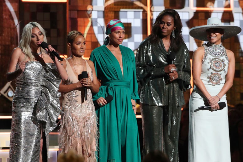AP19042050019331 Lady Gaga, from left, Jada Pinkett Smith, Alicia Keys, Michelle Obama and Jennifer Lopez speak at the 61st annual Grammy Awards on Sunday, Feb. 10, 2019, in Los Angeles. (Photo by Matt Sayles/Invision/AP)