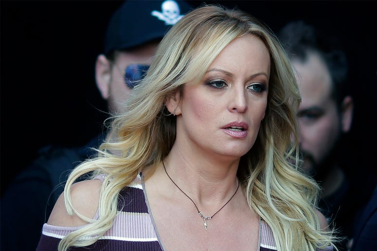 AP19066827647525 In this Oct. 11, 2018, file photo, adult film actress Stormy Daniels arrives at the adult entertainment fair "Venus" in Berlin. (AP Photo/Markus Schreiber, File)
