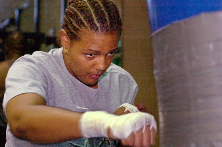 AP19070601590556 In this June 16, 2000, file photo, Freeda Foreman works out in a gym in Las Vegas. (AP Photo/Laura Rauch, File)