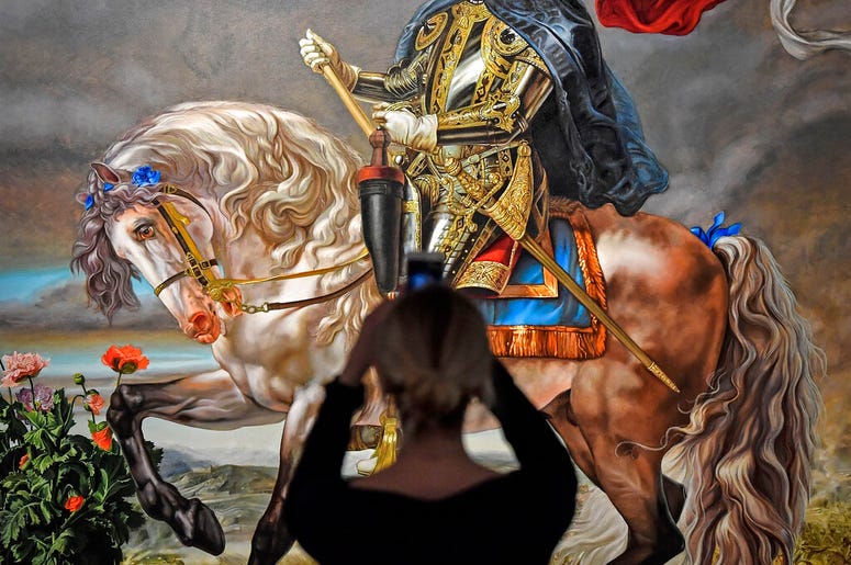 AP19080417910737 A visitor takes a smartphone picture of the painting 'Equestrian portrait of King Philipp II (Michael Jackson)' from US artist Kehinde Wiley at a preview of the exhibition 'Michael Jackson: On The Wall' at the Bundeskunsthalle museum in Bonn, Germany, Thu