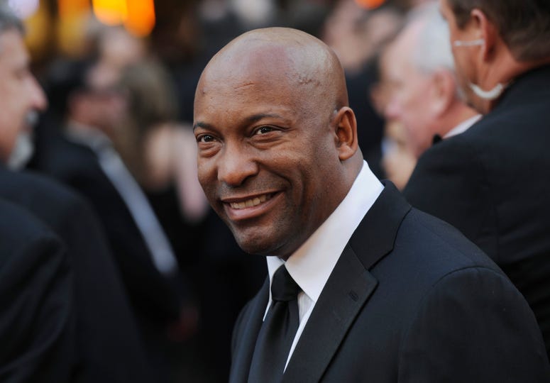 AP19110734694769 In this Feb. 24, 2008 file photo, director John Singleton arrives at the 80th Academy Awards in Los Angeles. Oscar-nominated filmmaker John Singleton has died at 51, according to statement from his family, Monday, April 29, 2019. He died Monday after suff