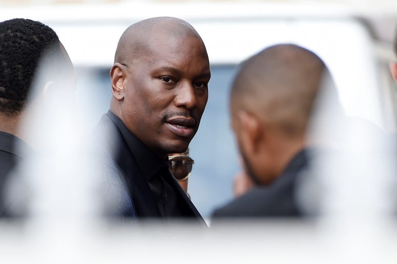AP19126640460051 Tyrese, who was a cast member in director John Singleton's 2001 film "Baby Boy," arrives at a memorial service for Singleton at Angelus Funeral Home, Monday, May 6, 2019, in Los Angeles. Singleton died on April 29 following a stroke. (AP Photo/Chris Pizze