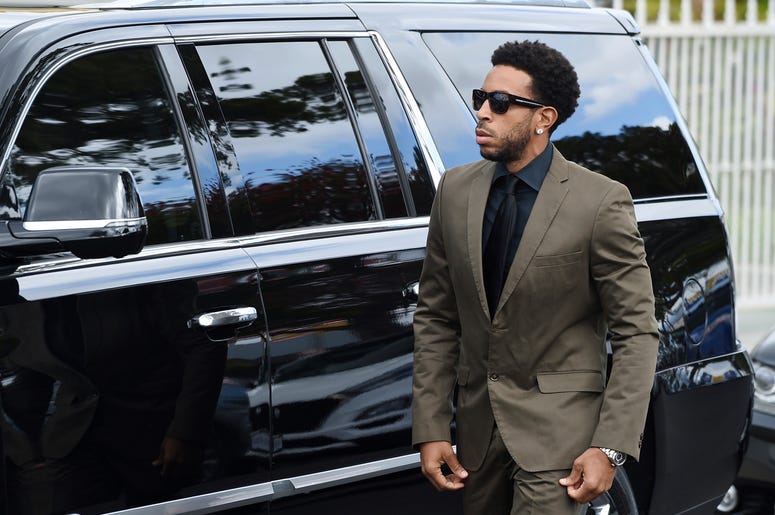 AP19126643568840 Actor/rapper Chris "Ludacris" Bridges arrives at a memorial service for the late film director John Singleton at Angelus Funeral Home, Monday, May 6, 2019, in Los Angeles. Singleton died on April 29 following a stroke. (AP Photo/Chris Pizzello)