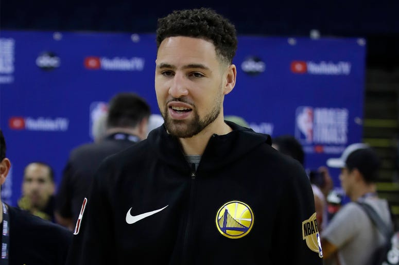 AP19157723091036 Golden State Warriors' Klay Thompson walks off the court after practice for the NBA Finals against the Toronto Raptors Thursday, June 6, 2019, in Oakland, California. (AP Photo/Ben Margot)