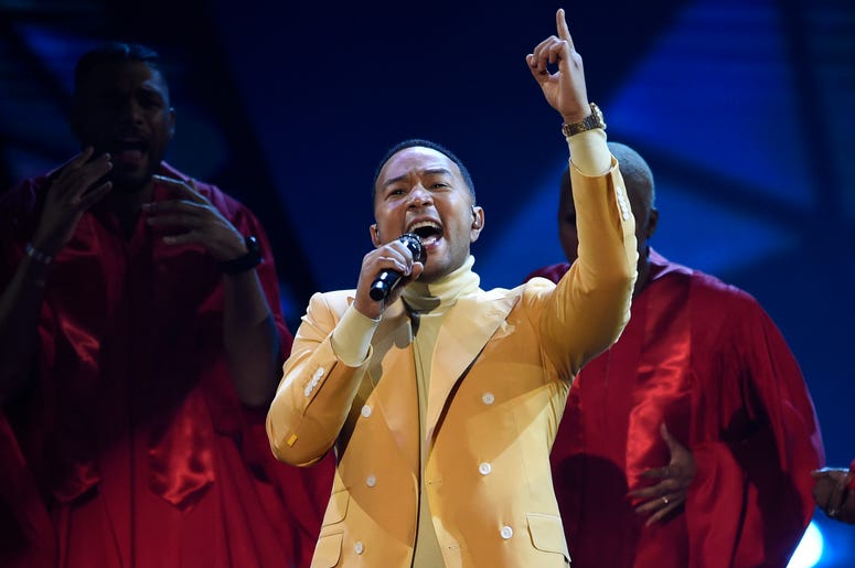 AP19162161072492 In this March 14, 2019, file photo, John Legend performs "Preach" at the iHeartRadio Music Awards at the Microsoft Theater in Los Angeles. (Chris Pizzello/Invision/AP, File)