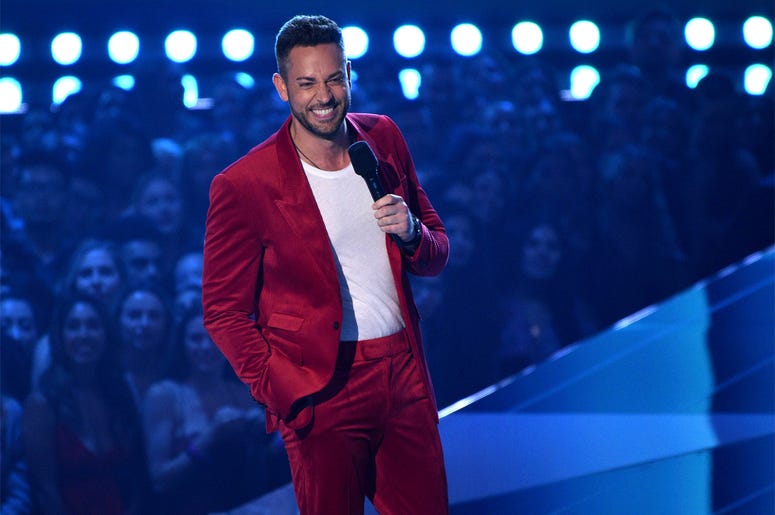 AP19169037601386 Host Zachary Levi speaks at the MTV Movie and TV Awards on Saturday, June 15, 2019, at the Barker Hangar in Santa Monica, Calif. (Photo by Chris Pizzello/Invision/AP)