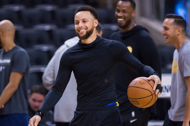 AP19177693100667 In this May 29, 2019 file photo, Golden State Warriors guard Stephen Curry smiles during practice for the NBA Finals against the Toronto Raptors in Toronto. (Nathan Denette/The Canadian Press via AP, File)