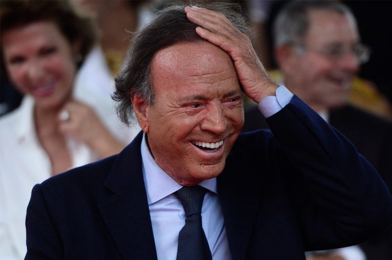 AP19191538930706 In this Sept. 29, 2016 file photo, Spain's singer Julio Iglesias smiles during his star unveiling ceremony at the Walk of Fame in San Juan, Puerto Rico. (AP Photo/Carlos Giusti, File)