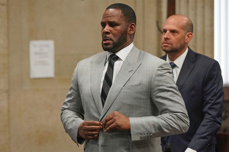 AP19197693163230 In this June 6, 2019, file photo, singer R. Kelly pleaded not guilty to 11 additional sex-related felonies during a court hearing before Judge Lawrence Flood at Leighton Criminal Court Building in Chicago. (E. Jason Wambsgans/Chicago Tribune via AP, Pool)