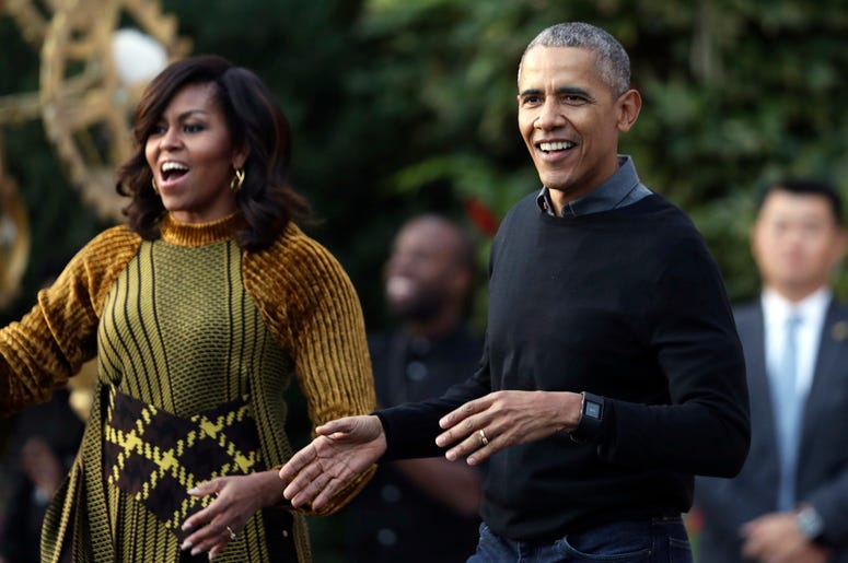 AP19236654708384 In this Oct. 31, 2016 file photo, President Barack Obama and the first lady Michelle Obama dance with kids to the beat of "Thriller" during a Halloween celebration at the South Portico of the White House in Washington. (AP Photo/Manuel Balce Ceneta, File)