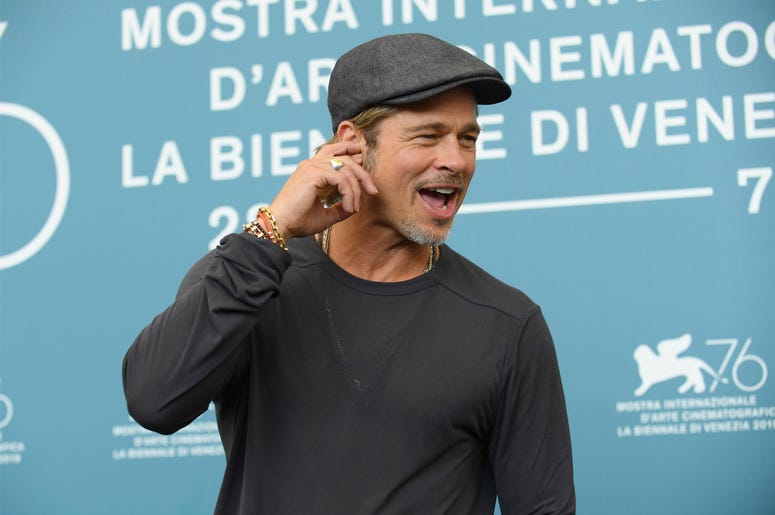 AP19241477356509 Actor Brad Pitt poses for photographers at the photo call for the film 'Ad Astra' at the 76th edition of the Venice Film Festival in Venice, Italy, Thursday, Aug. 29, 2019. (Photo by Arthur Mola/Invision/AP)