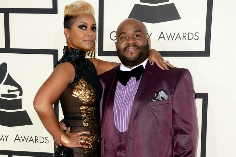 AP19247645091627 This Jan. 26, 2014 file photo shows songwriter LaShawn Daniels, right, and his wife April Daniels at the 56th annual Grammy Awards in Los Angeles. (Photo by Jordan Strauss/Invision/AP, File)