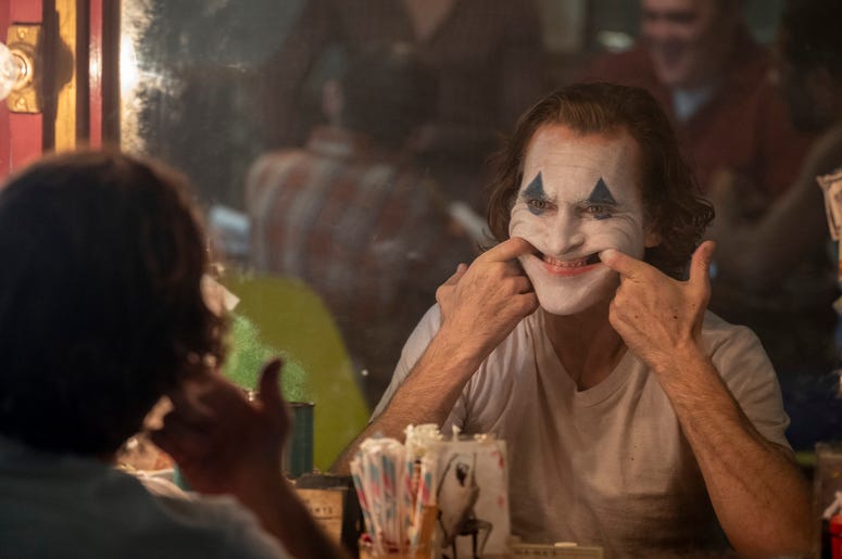 Joaquin Phoenix in a scene from the film "Joker" This image released by Warner Bros. Pictures shows Joaquin Phoenix in a scene from the film "Joker." (Niko Tavernise/Warner Bros. Pictures via AP)