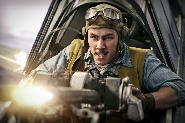 AP19303776561026 This image released by Lionsgate shows Nick Jonas in a scene from "Midway." (Reiner Bajo/Lionsgate via AP)