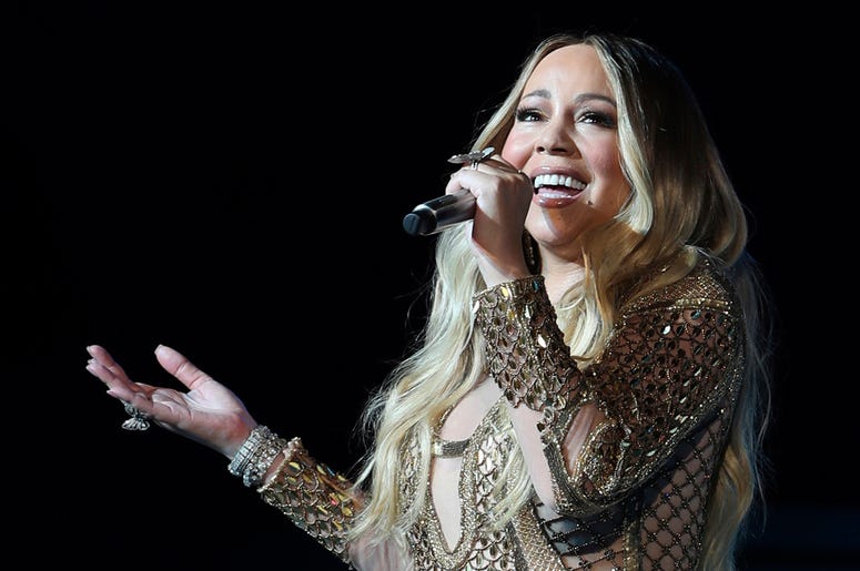 AP19311631766706 This Oct. 20, 2019 file photo shows Mariah Carey performing during a concert celebrating Dubai Expo 2020 One Year to Go in Dubai, United Arab Emirates. (AP Photo/Kamran Jebreili, File)