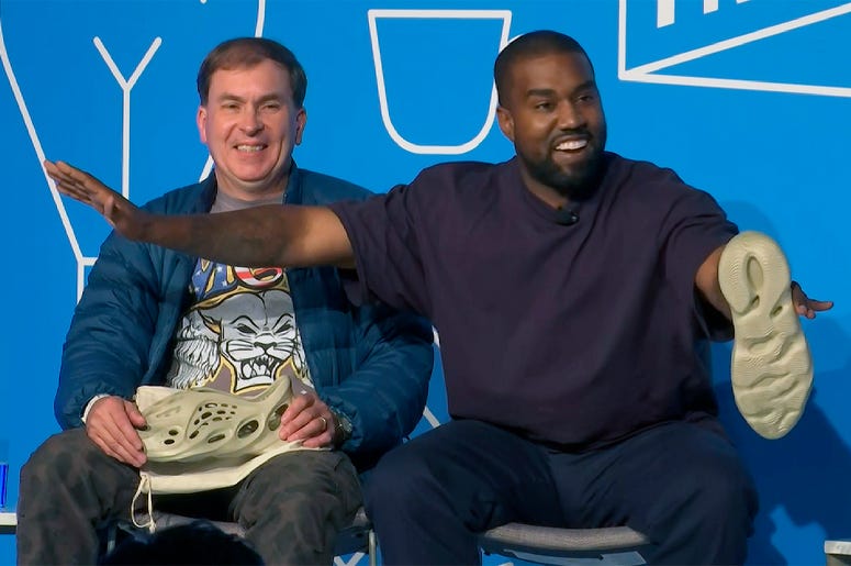 AP19311706226333 This image taken from video shows Kanye West, right, with Steven Smith, lead designer at Yeezy during a discussion on fashion and design at the Fast Company Innovation Festival in New York on Thursday, Nov. 7, 2019. (AP Photo/David Martin)