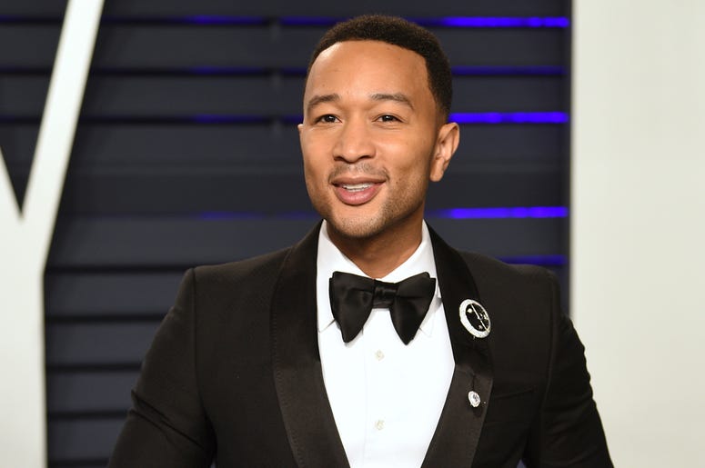 AP19317005731766 This Feb. 24, 2019 file photo shows John Legend at the Vanity Fair Oscar Party in Beverly Hills, Calif. People magazine has named Legend as the sexiest man alive in their special double issue on newsstands nationwide on Nov. 15. (Photo by Evan Agostini/In