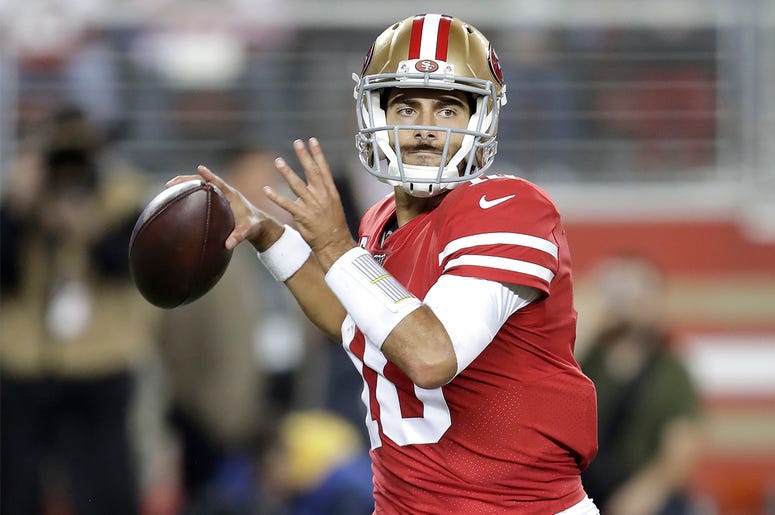 AP19329113314785 San Francisco 49ers quarterback Jimmy Garoppolo (10) passes against the Green Bay Packers during the first half of an NFL football game in Santa Clara, Calif., Sunday, Nov. 24, 2019. (AP Photo/Ben Margot)