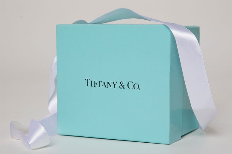 AP19329307415611 In this May 22, 2017 file photo, a gift box from Tiffany & Co. is arranged for a photo in Surfside, Fla. (AP Photo/Wilfredo Lee, File)
