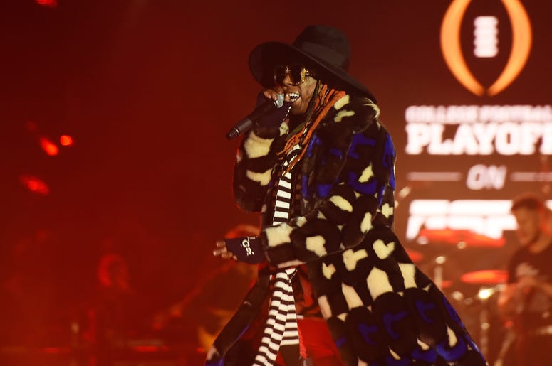Lil Wayne performs during the 2019 College Football Playoff National Championship Game Halftime Show at Treasure Island on January 7, 2019 in San Francisco, California Lil Wayne performs during the 2019 College Football Playoff National Championship Game Halftime Show at Treasure Island on January 7, 2019 in San Francisco, California