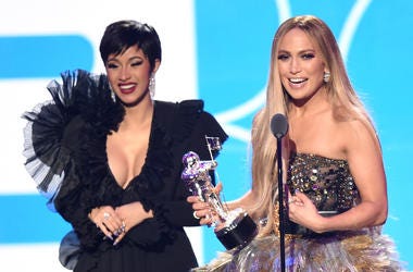Cardi B and Jennifer Lopez NEW YORK, NY - AUGUST 20: Cardi B, Jennifer Lopez, and DJ Khaled (not pictured) accept the award for Best Collaboration onstage during the 2018 MTV Video Music Awards at Radio City Music Hall on August 20, 2018 in New York City. (Photo by Michael Loccisan
