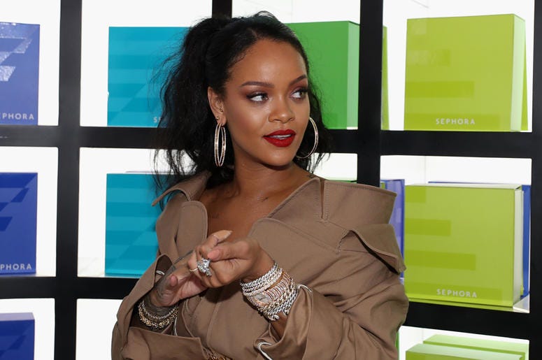Rihanna DUBAI, UNITED ARAB EMIRATES - SEPTEMBER 29: Rihanna arrives for the launch of Fenty Beauty's Stunna Lip paint 'Uninvited' at Sephora Dubai Mall on September 29, 2018 in Dubai, United Arab Emirates. (Photo by Francois Nel/Getty Images for Fenty Beauty)