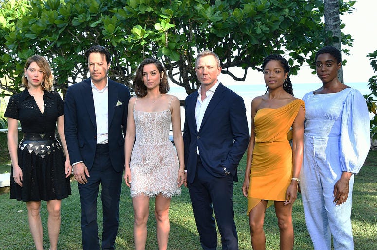 Cast of Bond 25 MONTEGO BAY, JAMAICA - APRIL 25: (L-R) Cast member Lea Seydoux, director Cary Joji Fukunaga, cast members Ana de Armas, Daniel Craig, Naomie Harris and Lashana Lynch attend the "Bond 25" film launch at Ian Fleming's Home 'GoldenEye' on April 25, 2019 in M
