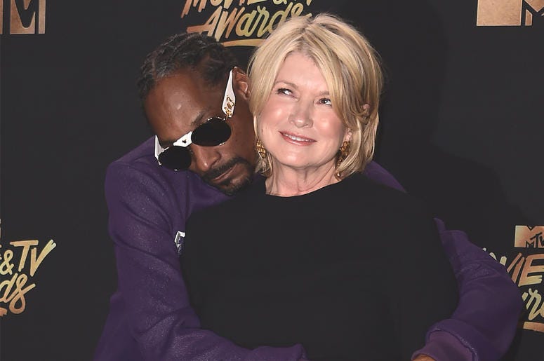 Snoop Dogg and Martha Stewart LOS ANGELES, CA - May 7: Snoop Dogg and Martha Stewart in the photo room at the 2017 MTV Movie & TV Awards at the Shrine Auditorium on May 7, 2017 in Los Angeles, California. (Photo by Scott Kirkland/PictureGroup)