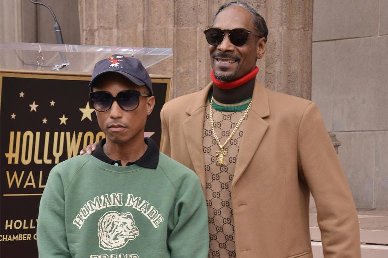 Pharrell Williams and Snoop Dogg (L-R) Pharrell Williams and Snoop Dogg at the Snoop Dogg Star On The Hollywood Walk Of Fame Ceremony held in front of the Jimmy Kimmel Live in Hollywood, CA on Monday, November 19, 2018. (Photo By Sthanlee B. Mirador/Sipa USA)