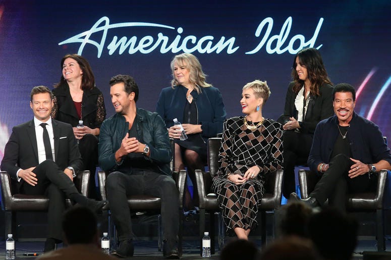 'American Idol' PASADENA, CA - JANUARY 08: (L-R, Back Row) Executive producer Jennifer Mullin, showrunner/executive producer Trish Kinane, co-executive producer Megan Michaels Wolflick (l-r, front row) host Ryan Seacrest, judges Luke Bryan, Katy Perry and Lionel Richie o