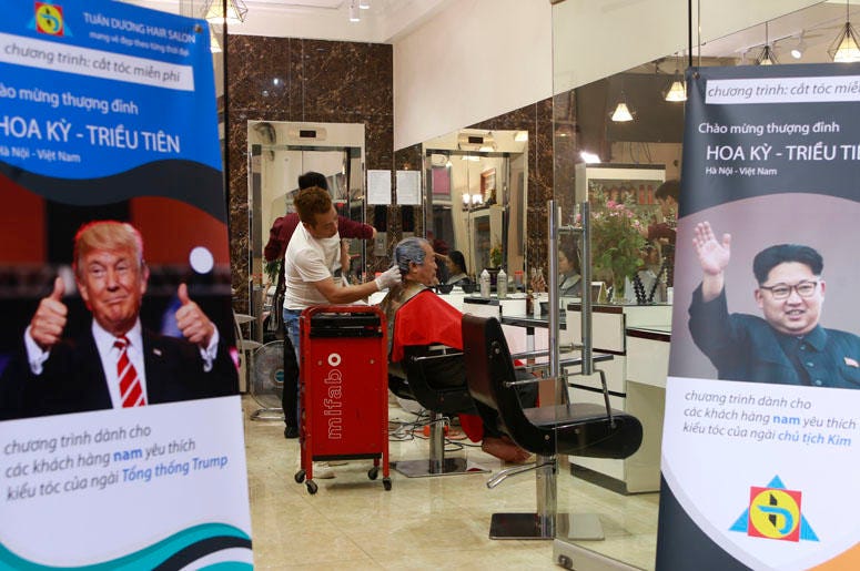 Le Phuc Hai, 66, receives a Trump haircut in Hanoi, Vietnam, on Tuesday, Feb. 19, 2019. U.S. President Donald Trump and North Korean leader Kim Jong Un have become the latest style icons in Hanoi, a week before their second summit is to be held in the cap