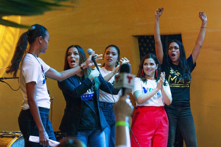 AP18308843049289 Zoe Saldana, from left, Eva Longoria, Gina Rodriguez, America Ferrera and Rosario Dawson join the New Florida Majority, the Florida Immigrant Coalition, the Center for Popular Democracy Action and the Latino Victory Project to host "Latinas en Marcha," a