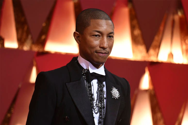 AP18343282919957 In this Feb. 26, 2017, file photo, Pharrell Williams arrives at the Oscars at the Dolby Theatre in Los Angeles. Cardi B, Pharrell, Kanye West were among the celebrities who fanned out across Miami for a week of glamorous parties toasting the world’s best