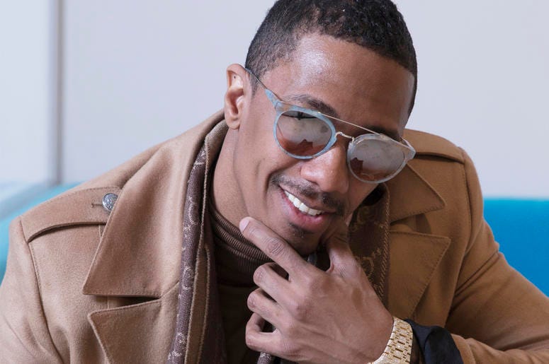 AP18345643839523 In this Dec. 10, 2018 photo, Nick Cannon poses for a portrait in New York to promote promoting his new show, "The Masked Singer." (Photo by Amy Sussman/Invision/AP)