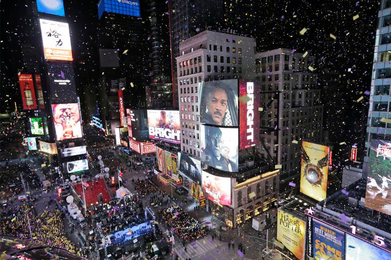 AP18352824618780 In this Jan. 1, 2018, file photo, confetti flies over Times Square during the New Year's celebration in New York. The New York Police Department is adding a drone this year to the security forces it uses to protect the huge crowds celebrating New Year's E