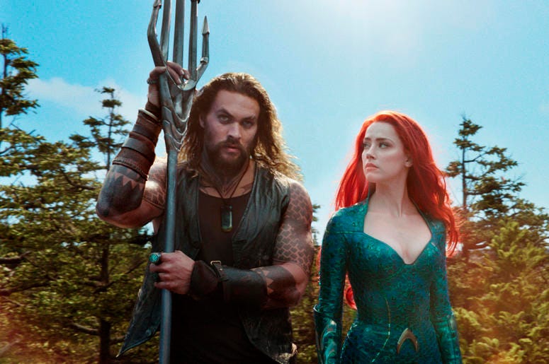 AP18357562388438 This image released by Warner Bros. Pictures shows Jason Momoa, left, and Amber Heard in a scene from "Aquaman." (Warner Bros. Pictures via AP)