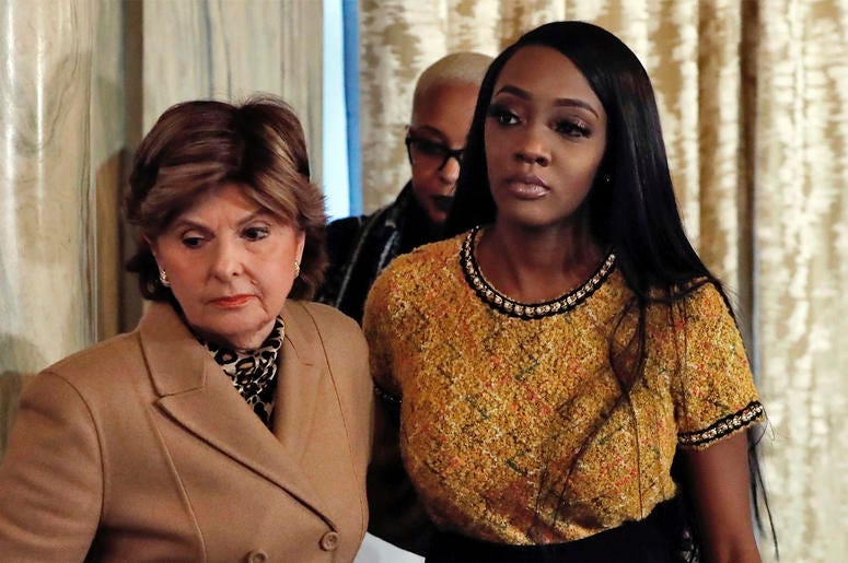AP19014657329117 Attorney Gloria Allred, left escorts Faith Rogers after a news conference about R&B singer R. Kelly in New York, Monday, Jan. 14, 2019. Kelly has been under fire since the recent airing of a Lifetime documentary "Surviving R. Kelly ." He has denied all al