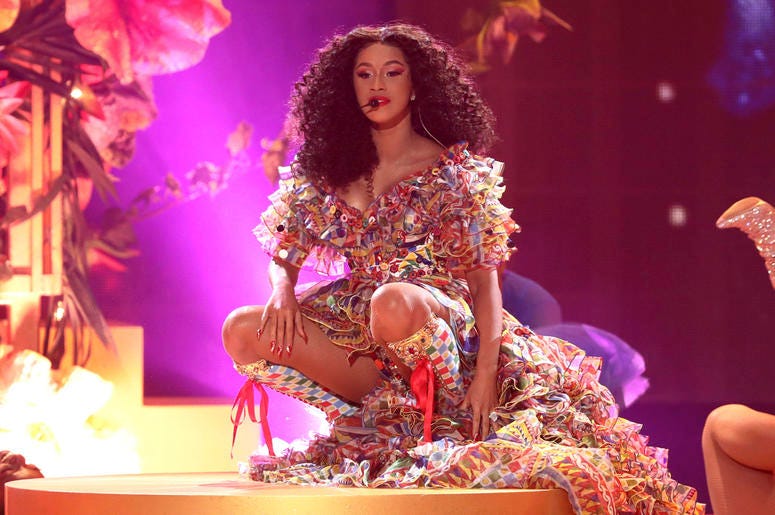 AP19033138388526 In this Tuesday, Oct. 9, 2018 file photo, Cardi B performs "I Like It" at the American Music Awards at the Microsoft Theater in Los Angeles. Cardi B says she received an offer to perform at the Super Bowl, but struggled with the decision to turn down the