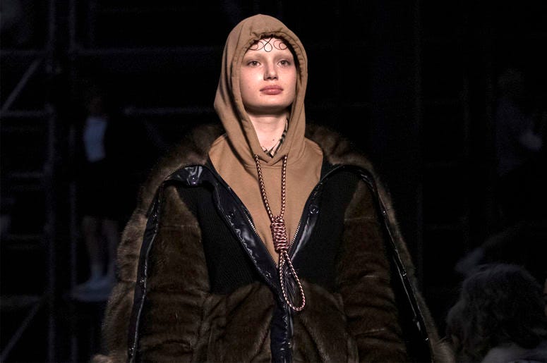 AP19050702258342 This Feb. 17, 2019 photo shows a model wearing a creation by Burberry at the Autumn/Winter 2019 fashion week runway show in London. The chief executive and chief creative officer of luxury powerhouse Burberry have apologized for putting a hoodie with stri