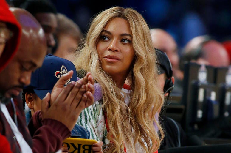 AP19094611393740 In this Feb. 19, 2017. file photo, Beyonce sits at court side during the second half of the NBA All-Star basketball game in New Orleans. (AP Photo/Max Becherer, File)