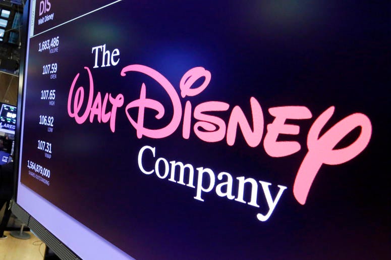 AP19101647557211 In this Aug. 8, 2017, file photo, The Walt Disney Co. logo appears on a screen above the floor of the New York Stock Exchange.