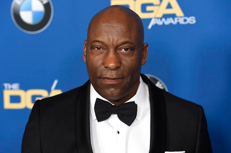 AP19110734540449 In this Feb. 3, 2018 file photo, John Singleton arrives at the 70th annual Directors Guild of America Awards in Beverly Hills, California. (Photo by Chris Pizzello/Invision/AP)