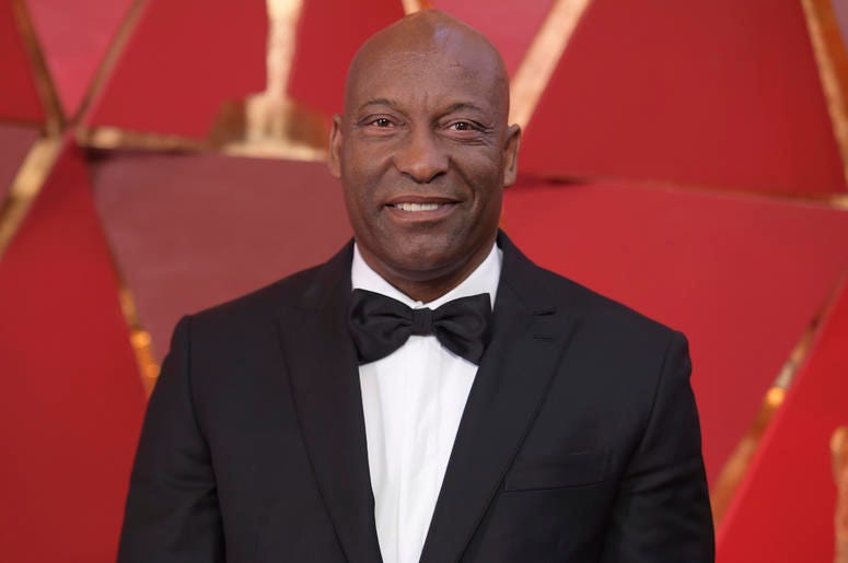AP19115813596443 This March 4, 2018 file photo shows John Singleton at the Oscars in Los Angeles. )Photo by Richard Shotwell/Invision/AP, File)