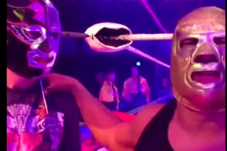 AP19132668712285 In this image made from video taken on Saturday, May 11, 2019, The Silver King, right, talks to the camera with fan Mark van der Enden at the Roundhouse in London. (@estefyunvin via AP)