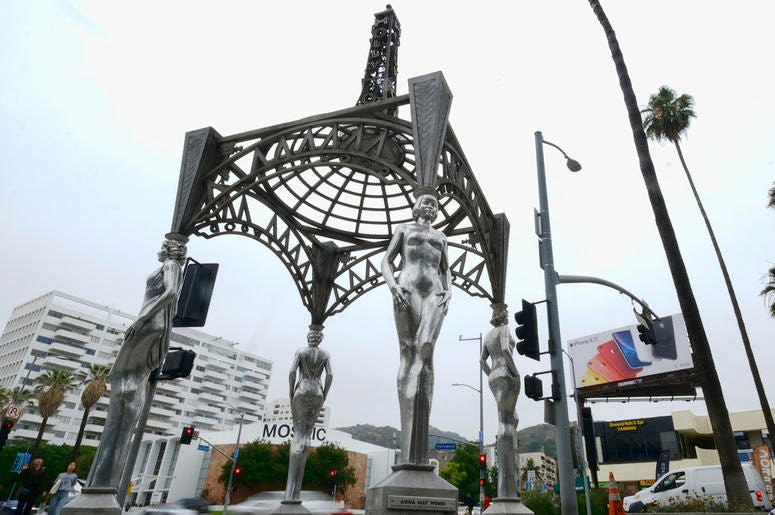 AP19170649806800 Pedestrians walk past the "Four Ladies of Hollywood" gazebo on Hollywood Boulevard in Los Angeles, on Wednesday June 19, 2019. (AP Photo/Richard Vogel)