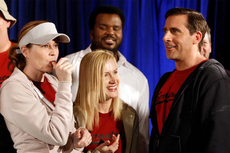 AP19177534208079 In this April 14, 2009, file photo cast members, from left, Jenna Fischer, Angela Kinsey, Craig Robinson, and Steve Carell are seen after cutting a cake celebrating the 100th episode of the television show "The Office" in Malibu, California. (AP Photo/Mat