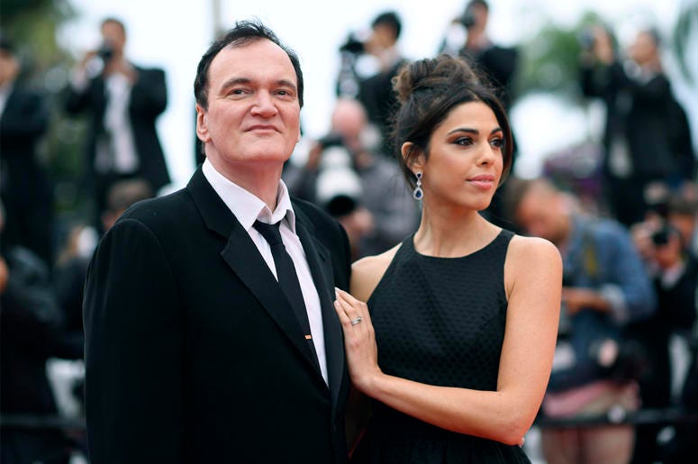 AP19234092887038 In this May 18, 2019 file photo, film director Quentin Tarantino and his wife Daniela Pick pose for photographers upon arrival at the premiere of the film "The Wild Goose Lake" at the 72nd international film festival, Cannes, southern France. (Photo by Ar