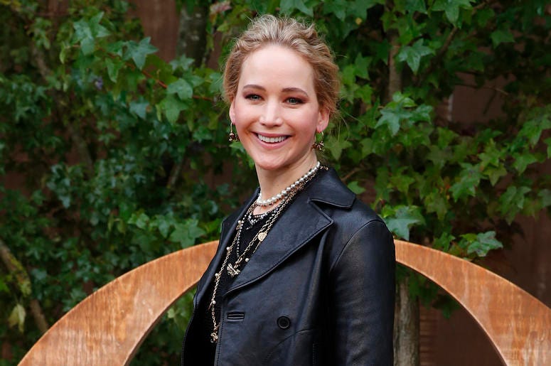 AP19293554003657 In this Sept. 24, 2019 file photo, actress Jennifer Lawrence smiles during a photocall before Dior's Ready To Wear Spring-Summer 2020 collection, unveiled during the fashion week, in Paris. (AP Photo/Francois Mori, File)