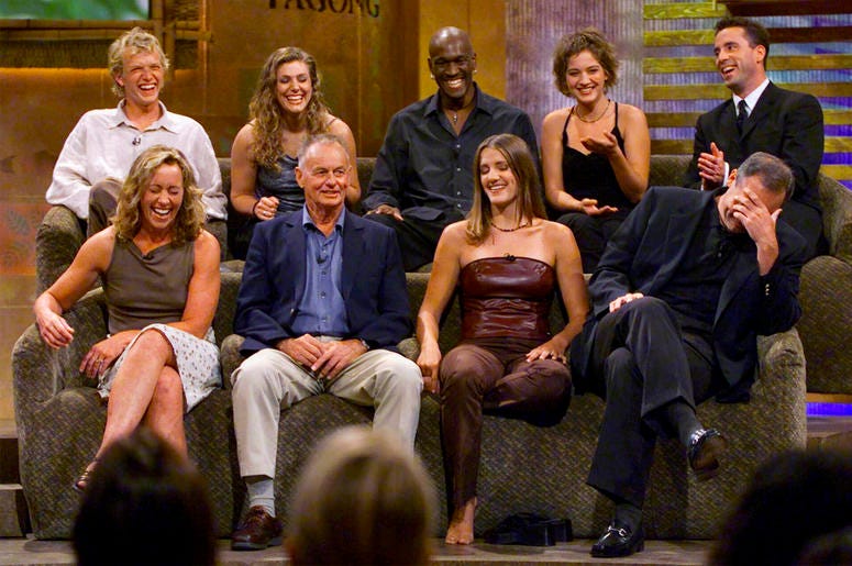 Survivors are, from left, bottom row, Susan Hawk, Rudy Boesch, Kelly Wiglesworth and Richard Hatch, covering his face, top row, Greg Buis, Jenna Lewis, Gervase Peterson, Colleen Haskell and Sean Kenniff. In this Aug. 23, 2000, file photo, a group of "Survivor" contestants, break into laughter during a live town hall meeting at CBS Studios in Hollywood in Los Angeles. Survivors are, from left, bottom row, Susan Hawk, Rudy Boesch, Kelly Wiglesworth and Rich