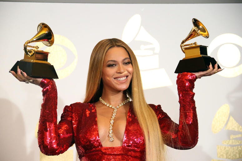 Beyonce Knowles poses during the 59th Annual GRAMMY Awards Beyonce Knowles poses during the 59th Annual GRAMMY Awards